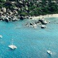 Aerial photograph of yachts moored off The Baths